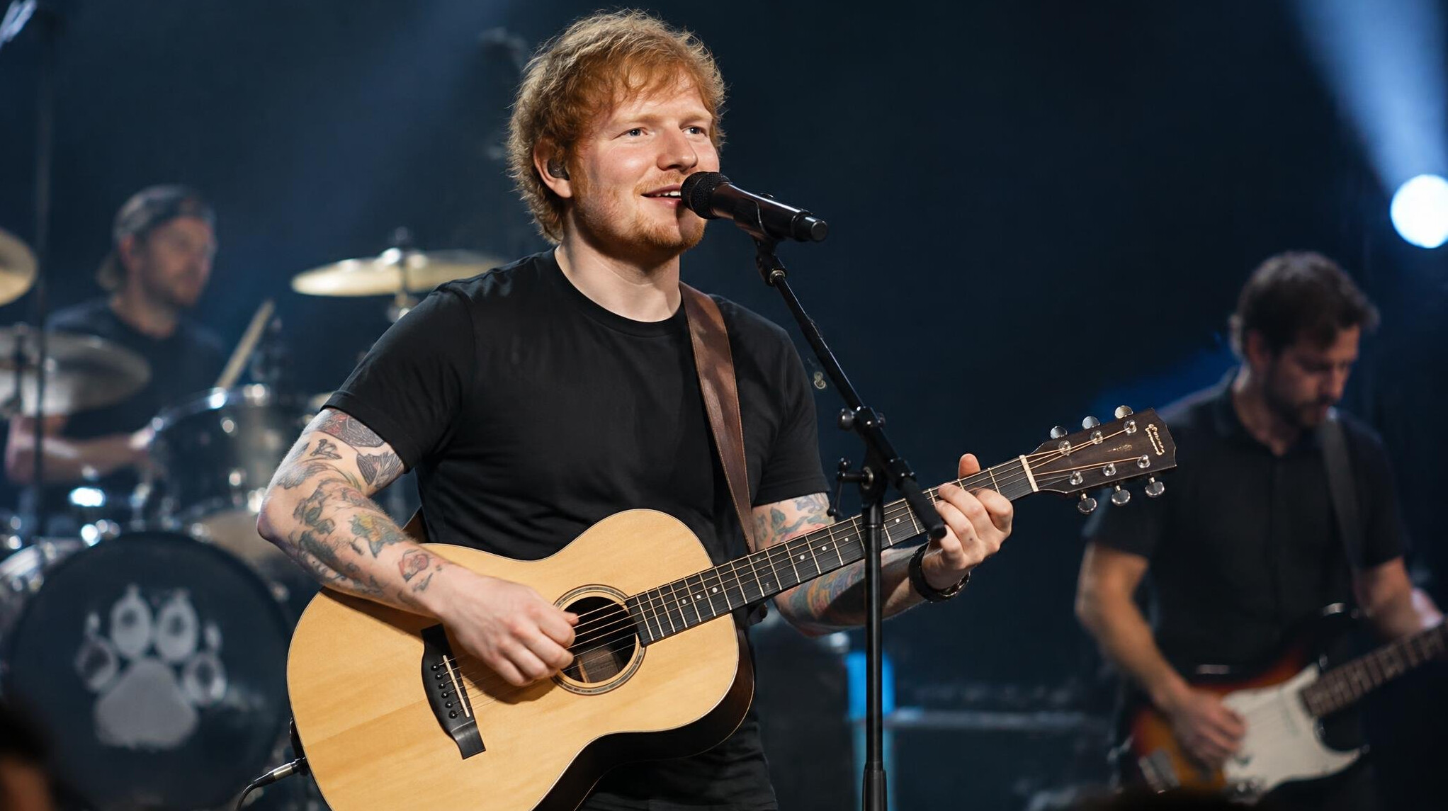 famous musician playing guitar